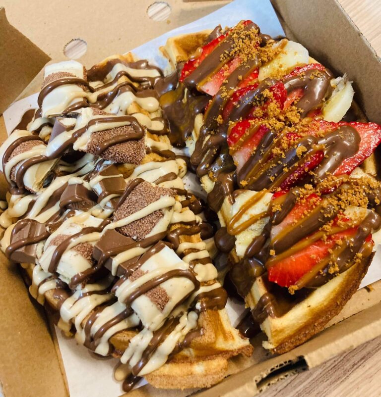 Half in half waffle, half with white bueno, chocolate sauce and the other half with bananas, strawberries and chocolate sauce, The Candee Man, Cowdenbeath, Fife