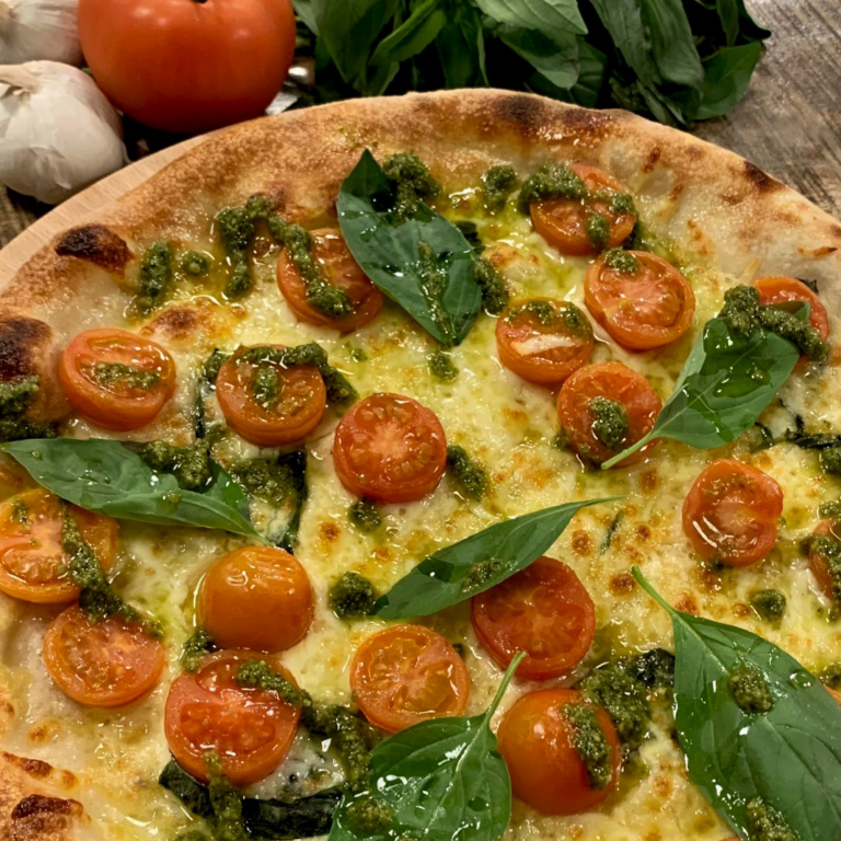 Cheese pizza with cherry tomatoes and spinach, Rocca Deli, St.Andrews Fife